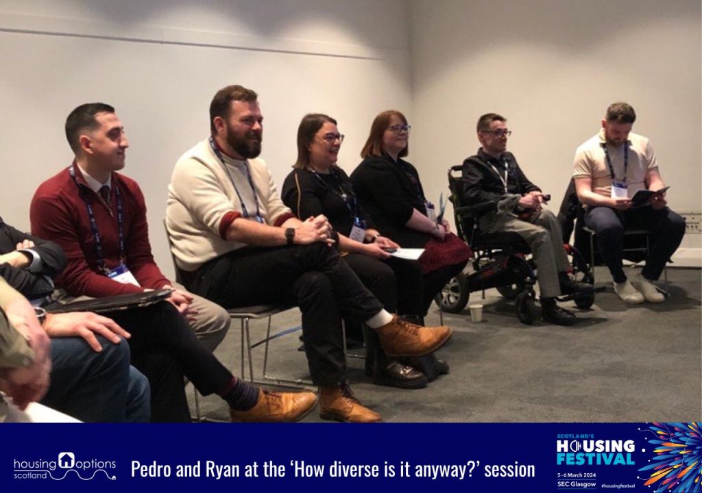 Photo of a panel discussion. Caption reads Pedro and Ryan at the 'How diverse is it anyway?' session